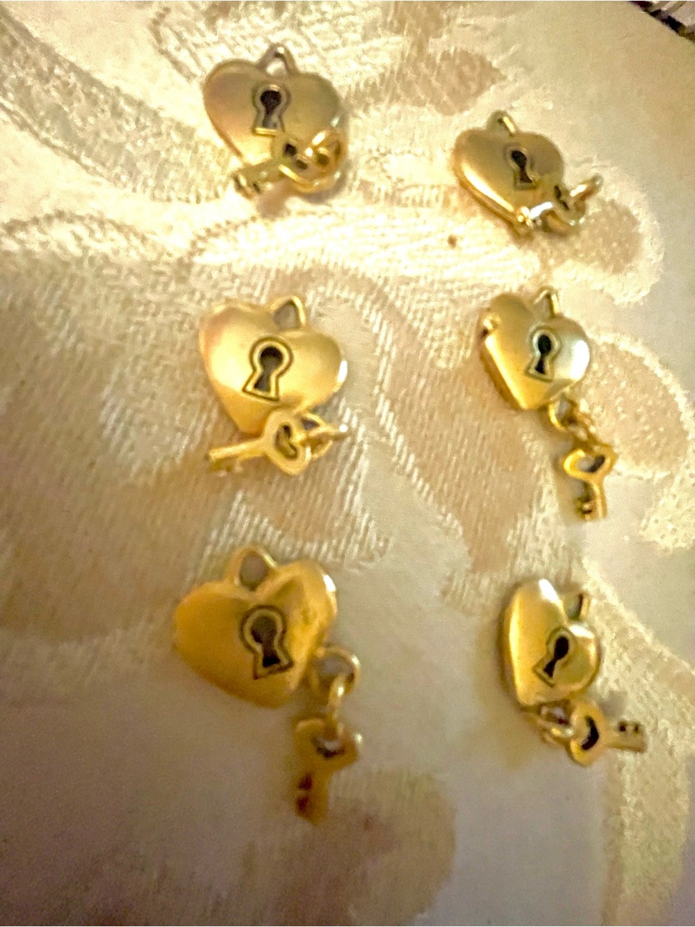 Gold-tone Heart Lock & Key Charms - Set of 49

Small charm.